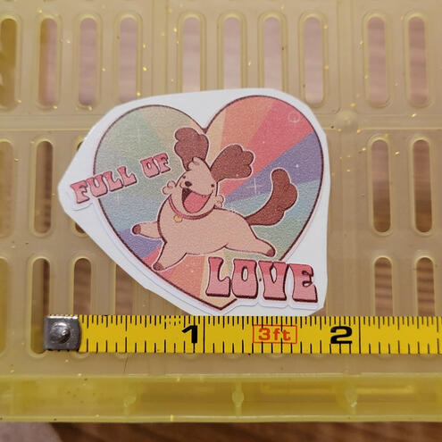 A photo of a dog sticker.