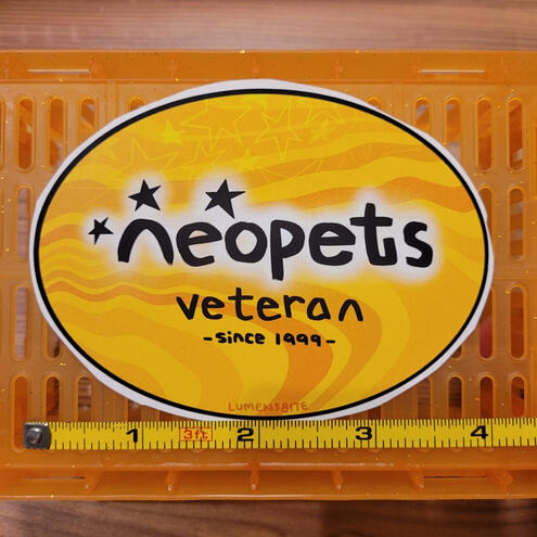 A photo of an oval-shaped Webkinz sticker.